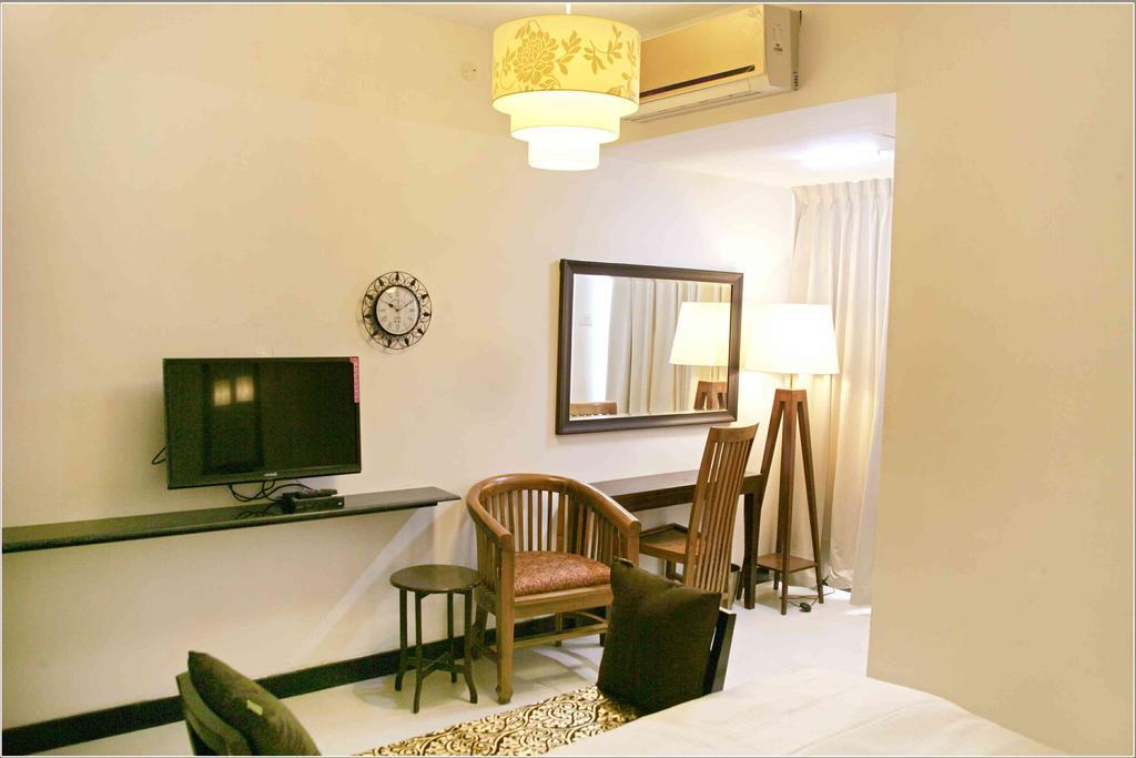 Hotel Highnest Singapperumalkovil Habitación foto